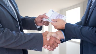 businessmen-with-bills businessmen-with-bills